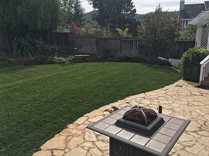 Lawn with new hardscape by our Gilroy landscape design team