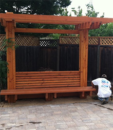 one of our pros is installing the new wood bench